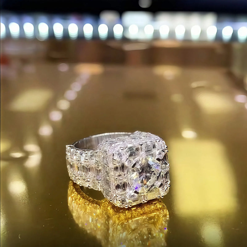Emerald cut diamonds pinky ring with Round diamonds with a 3 carat center stone