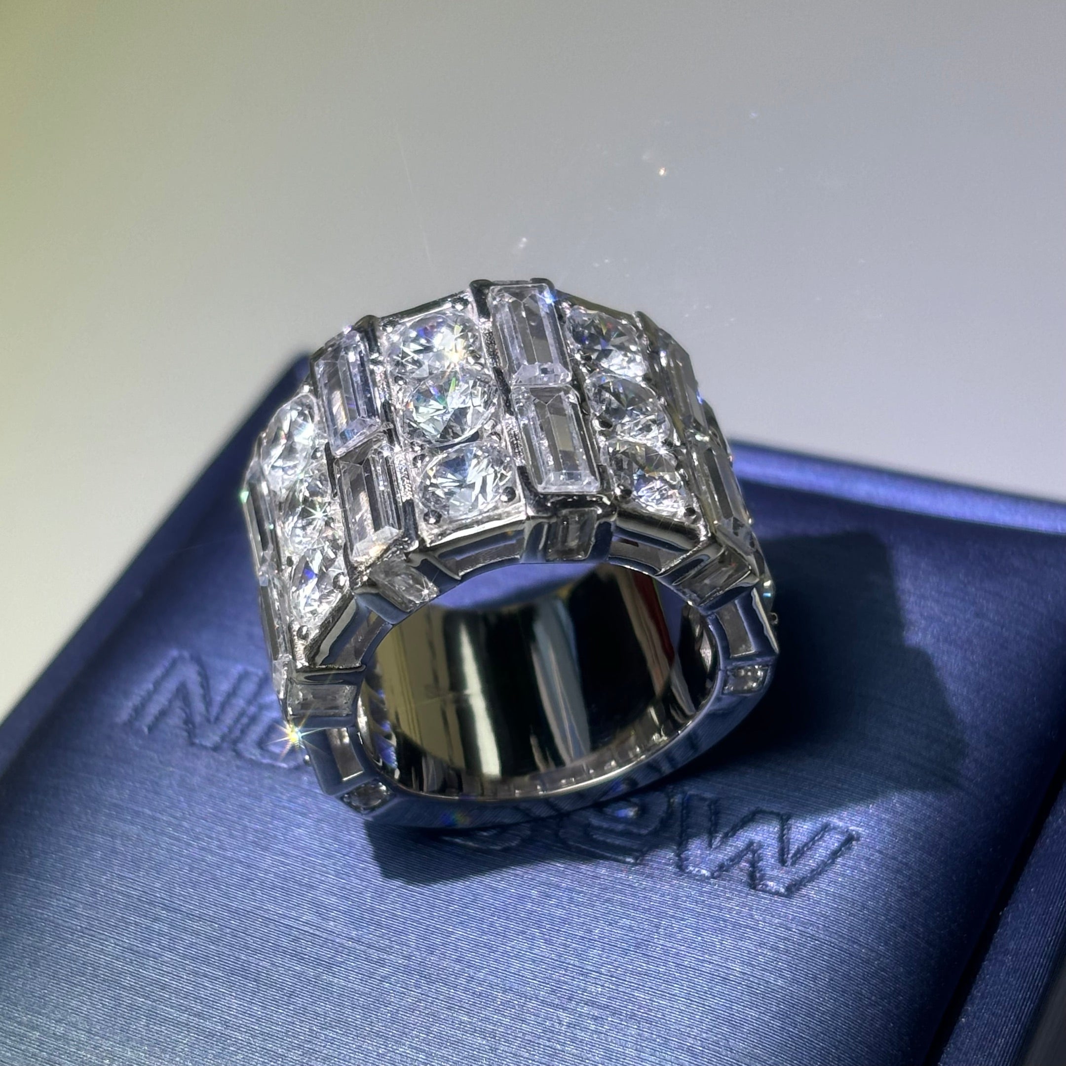 8.5Ctw round and rectangular cut wide ring with three rows of gemstones