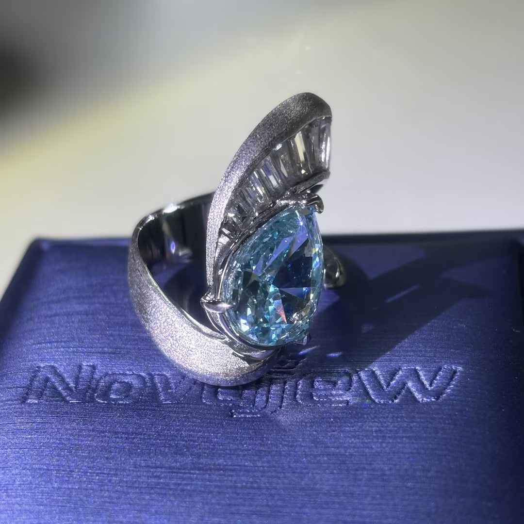 4Ctw Pear-shaped and rectangular gemstone rings
