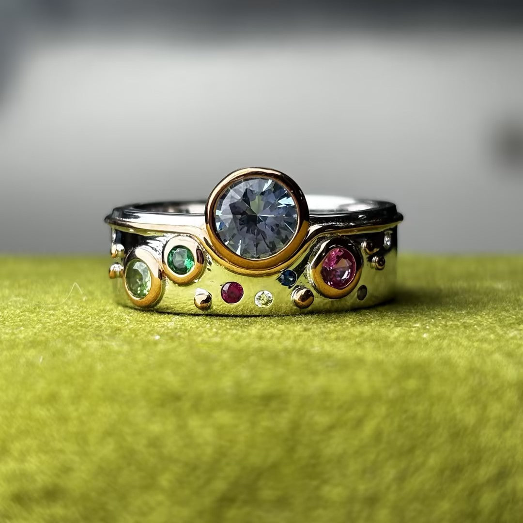 Multi-colored round gemstone bezel-set ring