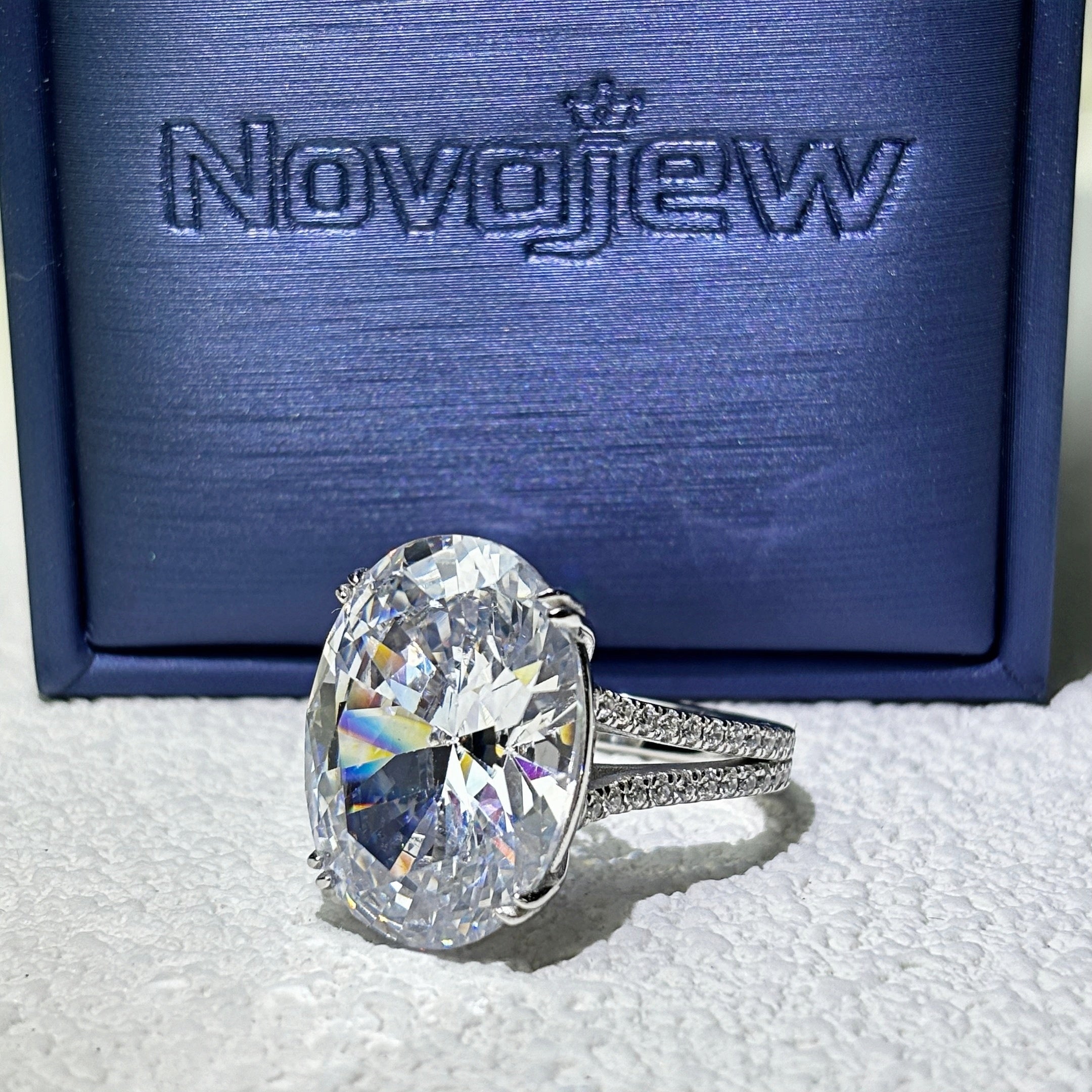 11Ct sparkling oval gemstone forked handle engagement ring