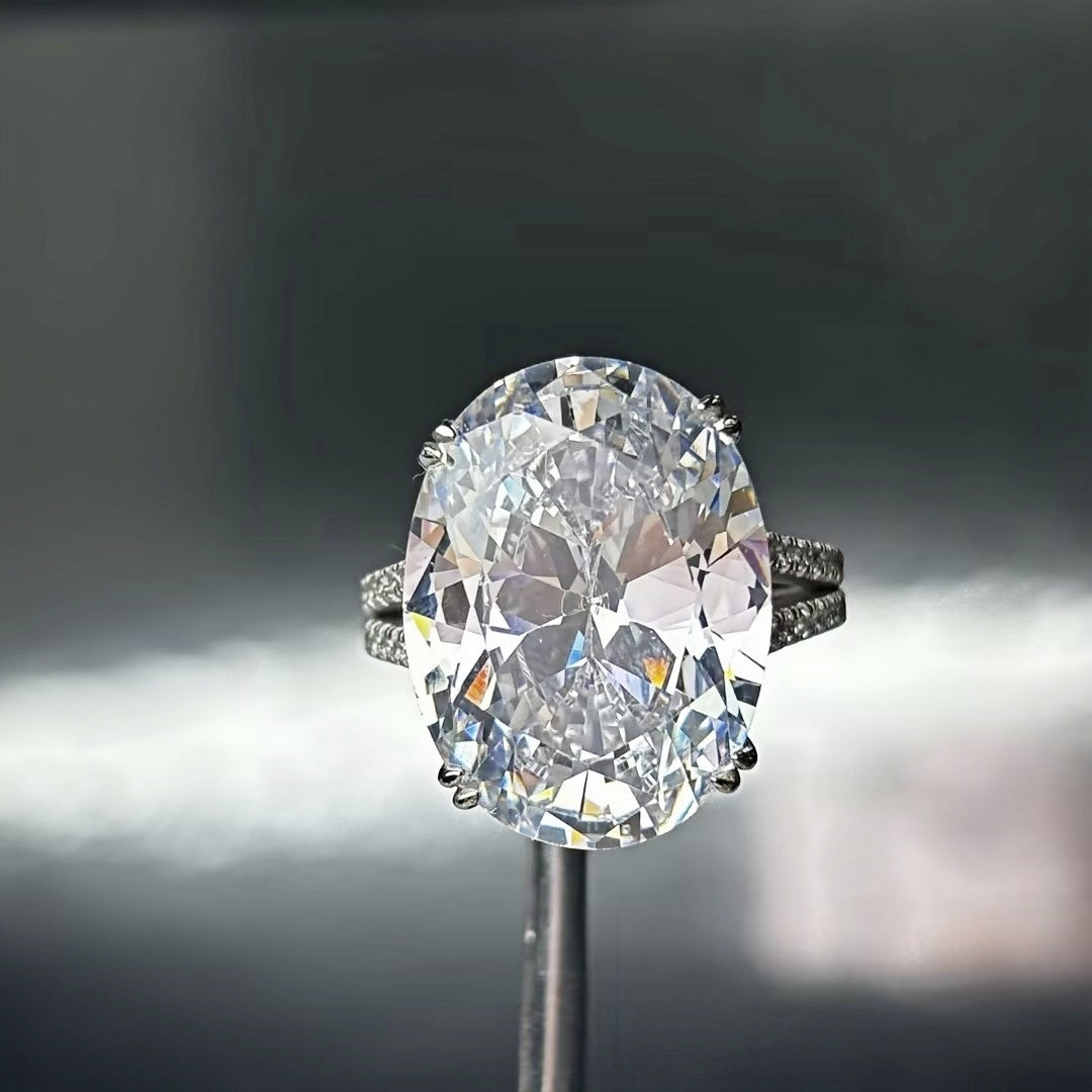 11Ct sparkling oval gemstone forked handle engagement ring