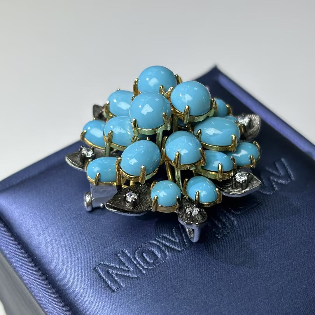 Turquoise flower pendant necklace and brooch