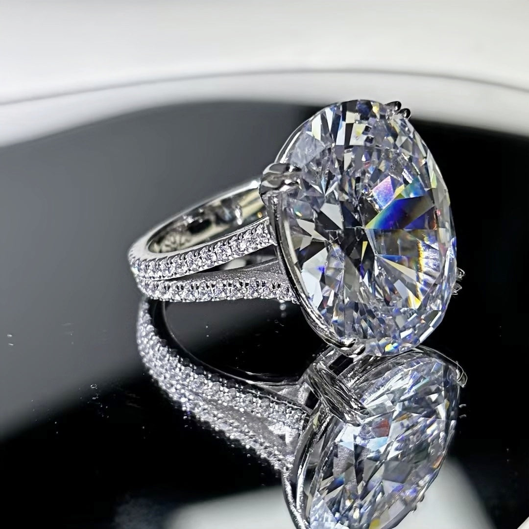 11Ct sparkling oval gemstone forked handle engagement ring