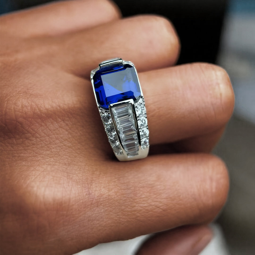 Octagonal emerald cut sapphire diamond ring