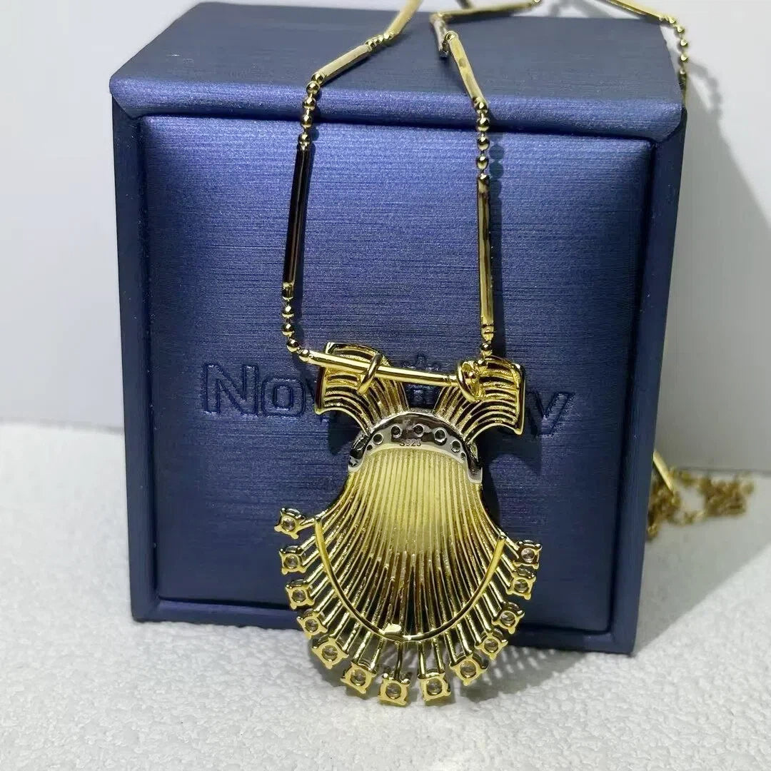 Vintage spiral-shaped gemstone pendant necklace