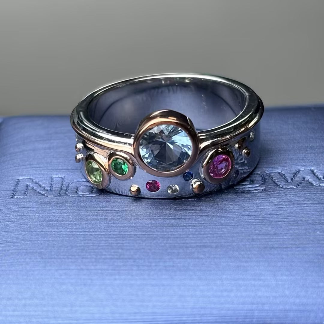 Multi-colored round gemstone bezel-set ring