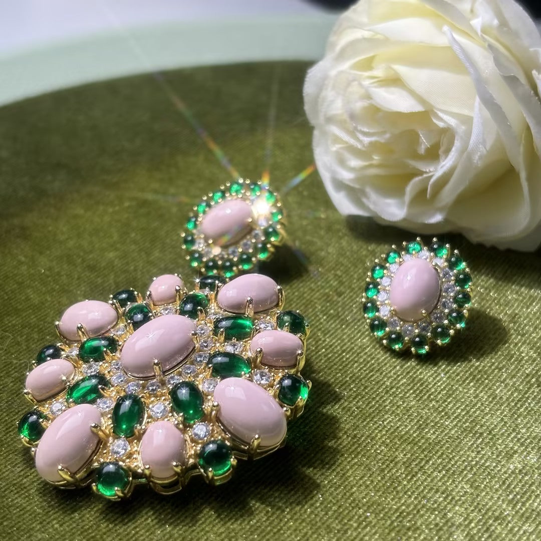 A unique turquoise and gemstone brooch, earrings, and pendant set