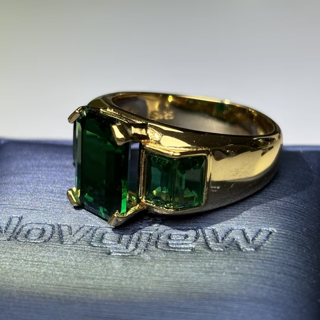 Legendary Octagonal Emerald Three-Stone Ring