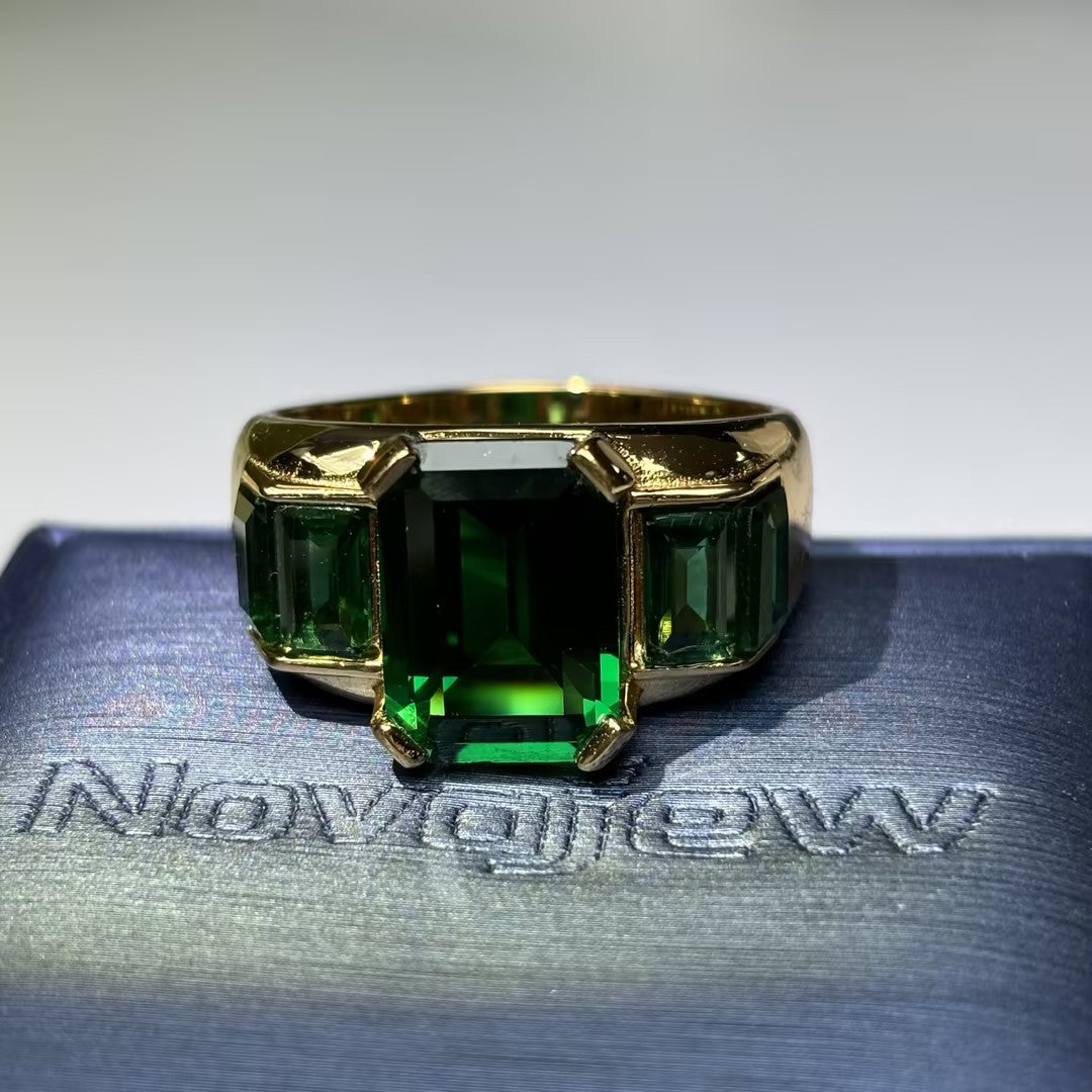 Legendary Octagonal Emerald Three-Stone Ring