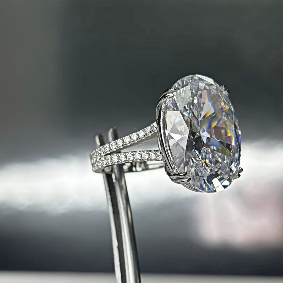 11Ct sparkling oval gemstone forked handle engagement ring