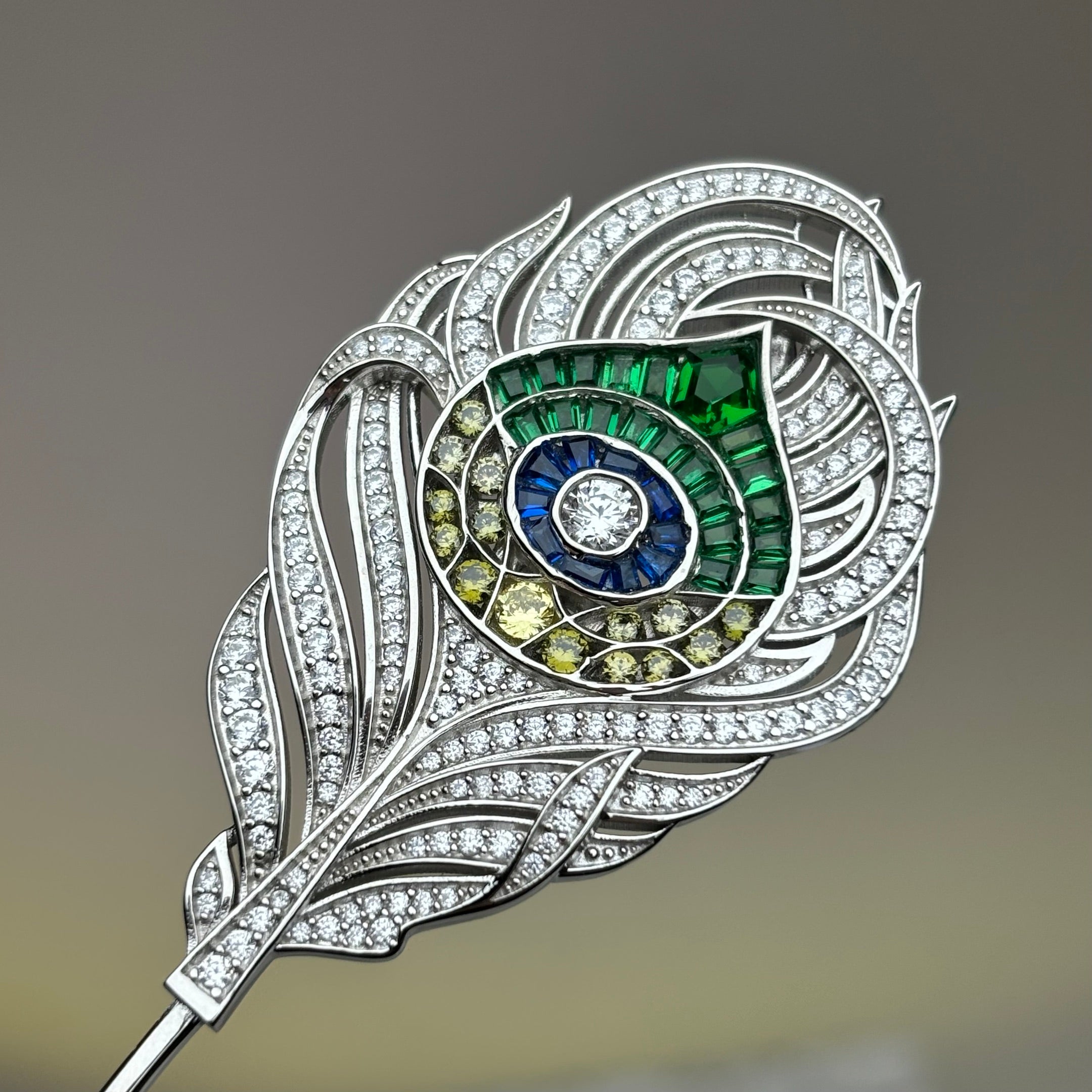 Peacock feather gemstone brooch
