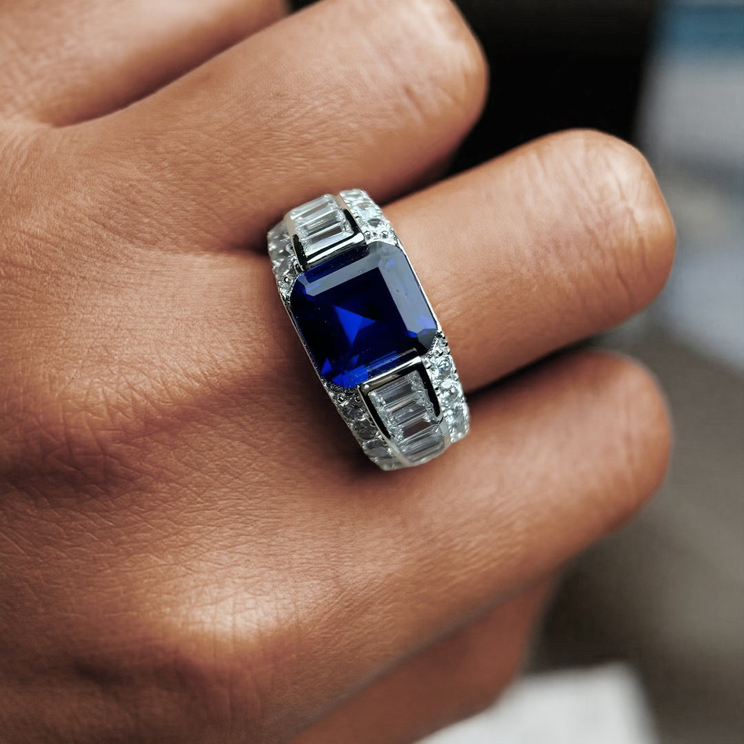 Octagonal emerald cut sapphire diamond ring
