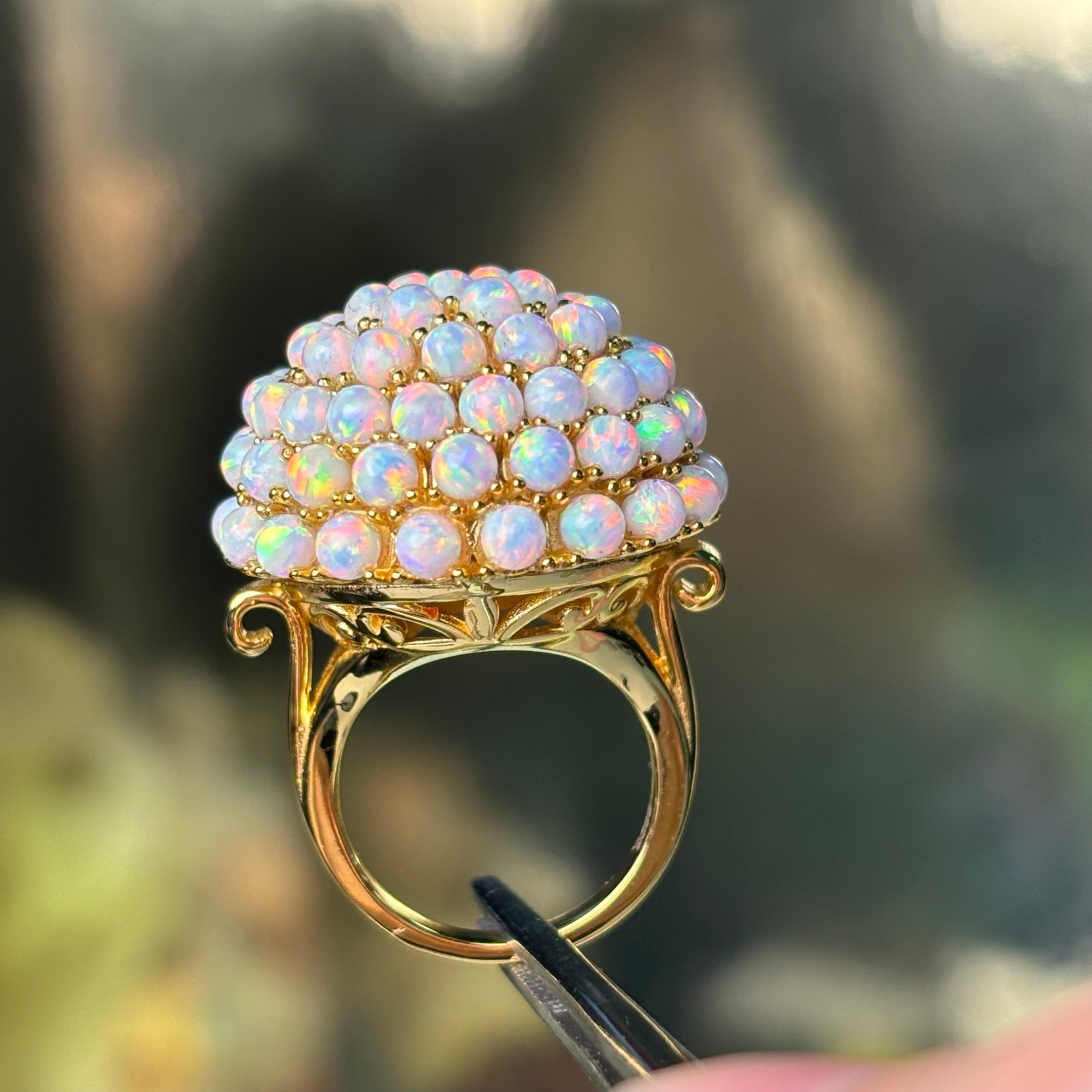 A captivating cabochon opal ring