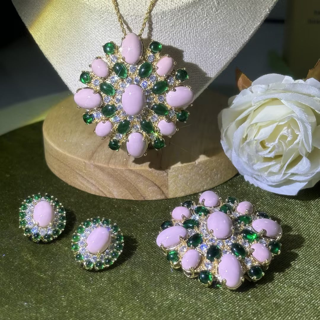 A unique turquoise and gemstone brooch, earrings, and pendant set