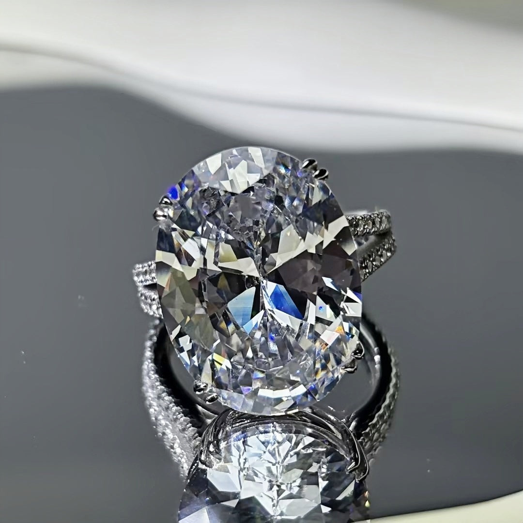 11Ct sparkling oval gemstone forked handle engagement ring