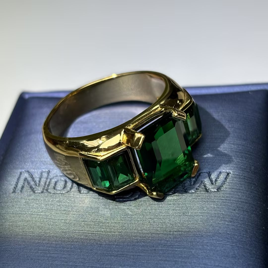 Legendary Octagonal Emerald Three-Stone Ring