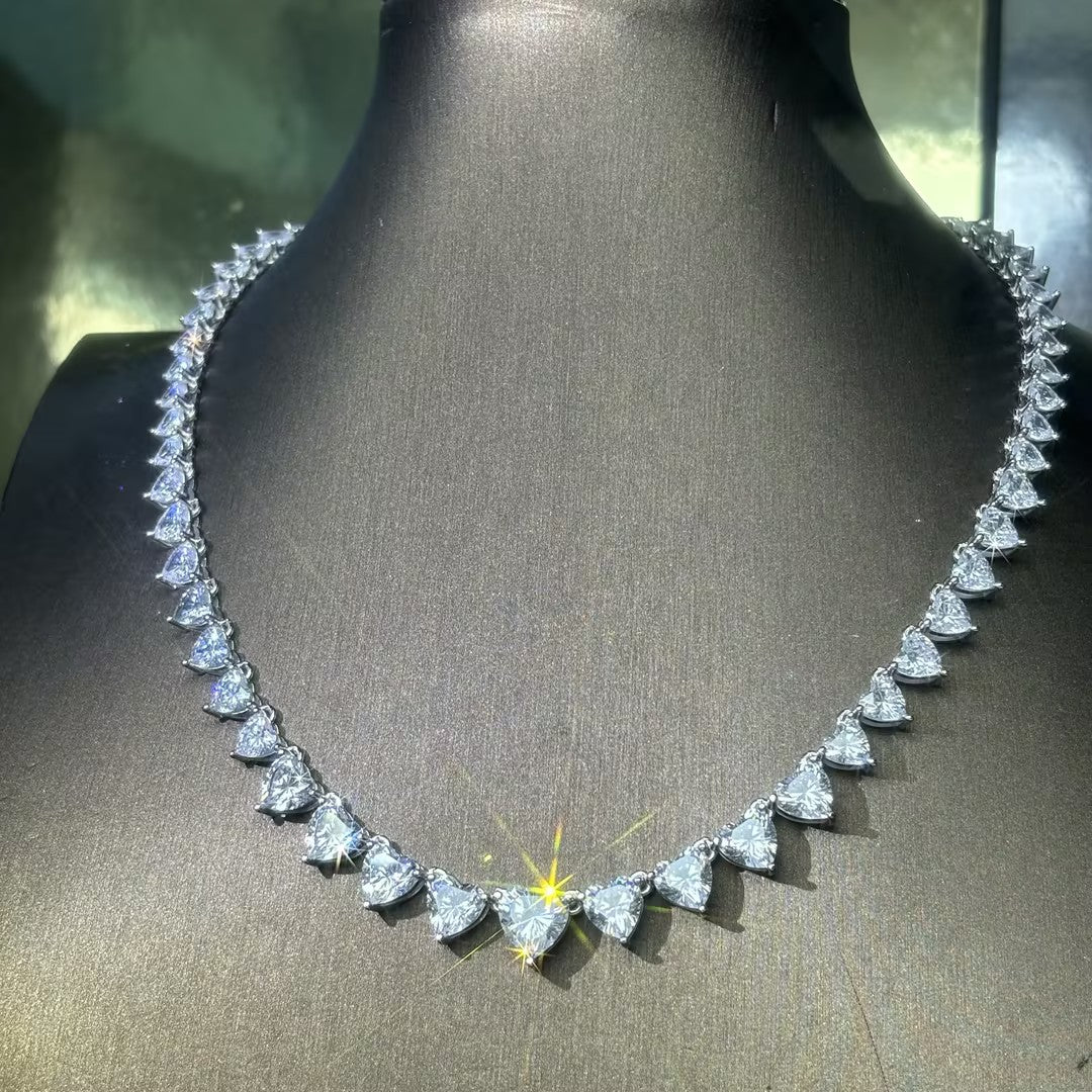 A collection of tennis necklaces with various cut gemstones